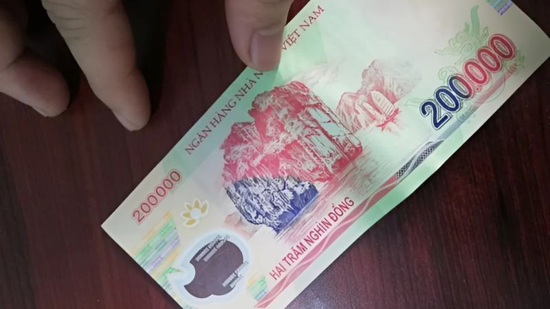 Điềm báo giấc mơ thấy tiền 200 nghìn nhặt được